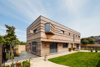 Clad in untreated timber with a distinctive horizontal design, this highly sustainable timber-frame home by Baufritz cost £600,000 to build