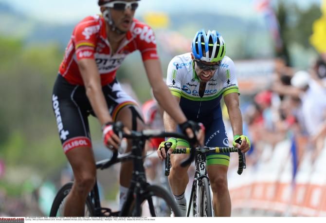 Michael Albasini (Orica-GreenEdge) crosses the line