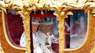 LONDON, UNITED KINGDOM - MAY 06: (EMBARGOED FOR PUBLICATION IN UK NEWSPAPERS UNTIL 24 HOURS AFTER CREATE DATE AND TIME) King Charles III and Queen Camilla return to Buckingham Palace in the Gold State Coach, built in 1762 and used at every coronation since William IV's in 1831, following their Coronation service at Westminster Abbey on May 6, 2023 in London, England. The Coronation of Charles III and his wife, Camilla, as King and Queen of the United Kingdom of Great Britain and Northern Ireland, and the other Commonwealth realms takes place at Westminster Abbey today. Charles acceded to the throne on 8 September 2022, upon the death of his mother, Elizabeth II.