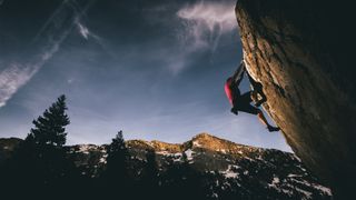 Rock climber at sunset in Yosemite