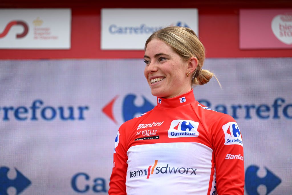 MIRADOR DE PEAS LLANAS SPAIN MAY 05 Demi Vollering of The Netherlands and Team SD Worx celebrates at podium as Red Leader Jersey winner during the 9th La Vuelta Femenina 2023 Stage 5 a 1292km stage from La Cabrera to Mirador de Peas Llanas 1479m UCIWWT on May 05 2023 in Mirador de Peas Llanas Spain Photo by Dario BelingheriGetty Images