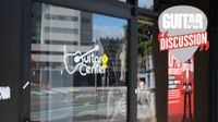The front of a Guitar Center store in Emeryville, California, photographed on November 12, 2025