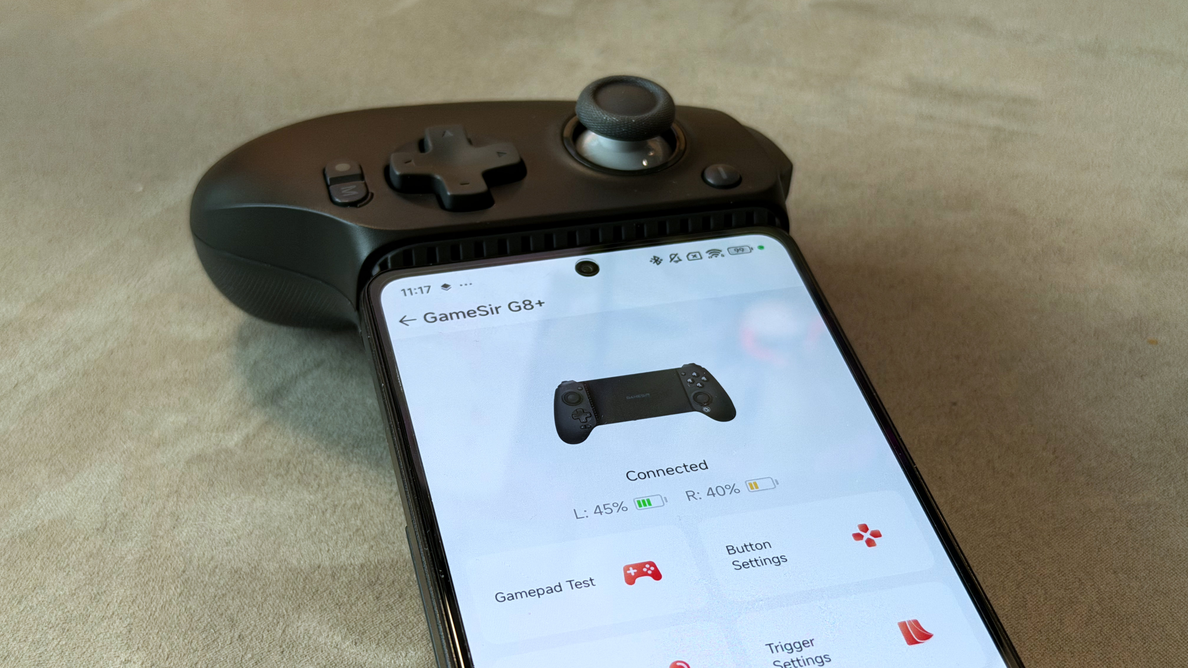 A black model of the GameSir G8 Plus Bluetooth mobile controller on a clean grey surface.