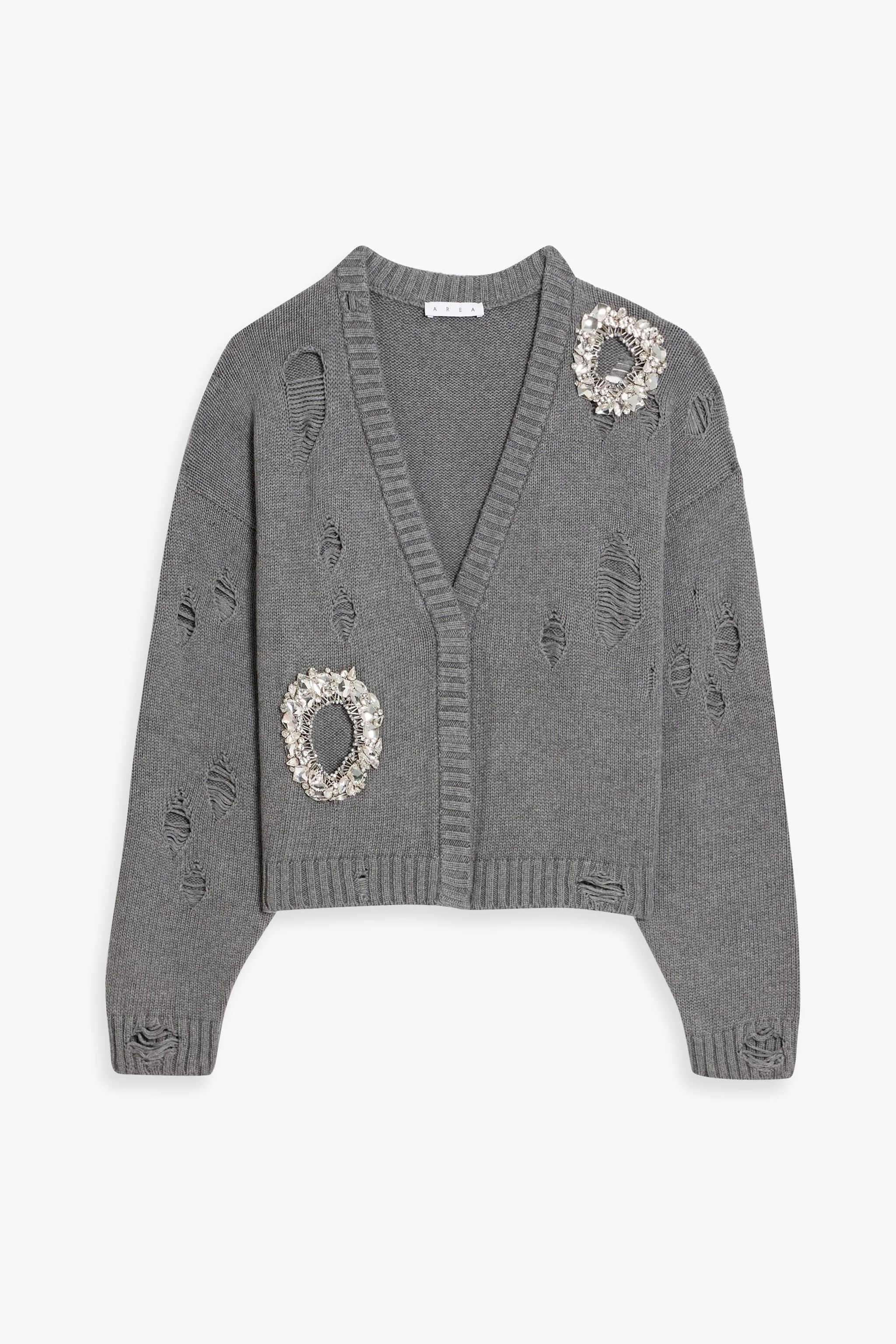 A grey, embellished Area cardigan.