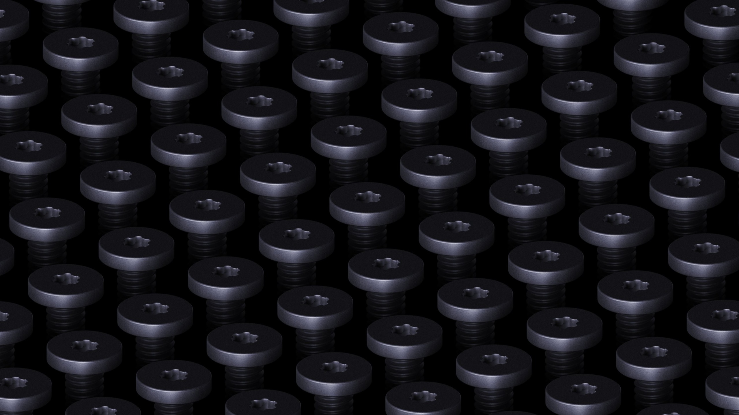 Close-up wallpaper showing dozens of dark metallic torque screws arranged in a repeating grid pattern against a black background, created for Microsoft's Surface Laptop Ultra.