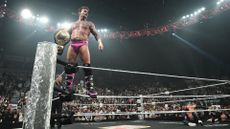 CM Punk holds WWE World Heavyweight Champion's belt in Belfast &ndash; January 2026