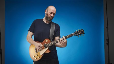 Chris Bird, the last editor of Total Guitar, playing a Les Paul