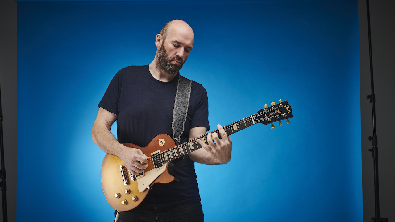 Chris Bird, the last editor of Total Guitar, playing a Les Paul