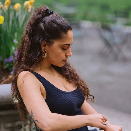Gabrielle Ulubay looking down