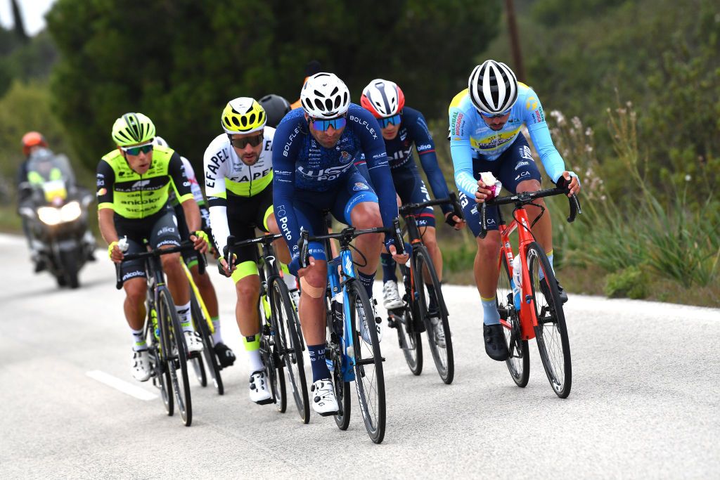 FARO PORTUGAL FEBRUARY 18 LR Afonso Eulalio of Portugal and Team Glassdrive Q8 Anicolor Rafael Jorge Magalhes Silva of Portugal and Team Efapel Cycling Samuel Jos Rodrigues Caldeira of Portugal and Team W52Fc Porto and Rafael Loureno of Portugal and Team Atum GeneralTaviraAp Maria Nova Hotel compete in the breakaway during the 48th Volta Ao Algarve 2022 Stage 3 a 2114km stage from Almodvar to Faro VAlgarve2022 on February 18 2022 in Faro Portugal Photo by Luc ClaessenGetty Images