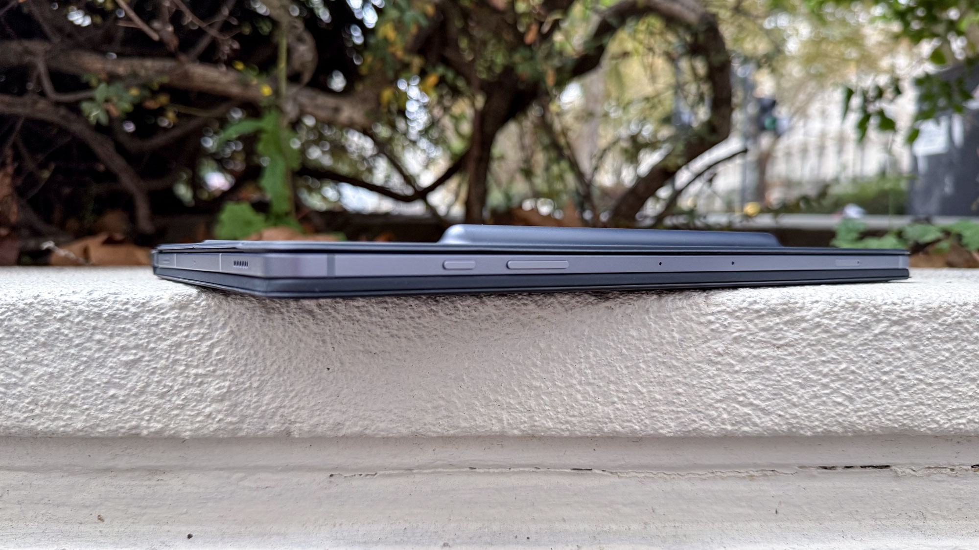 Samsung Galaxy Tab S10 Plus from side, in a case