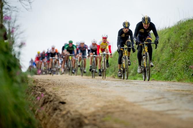 MTN - Qhubeka leading the peloton on an unpaved descent