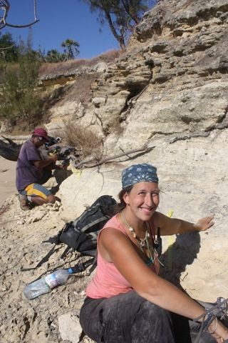 Karen Samonds excavates the rare dolphin fossil.