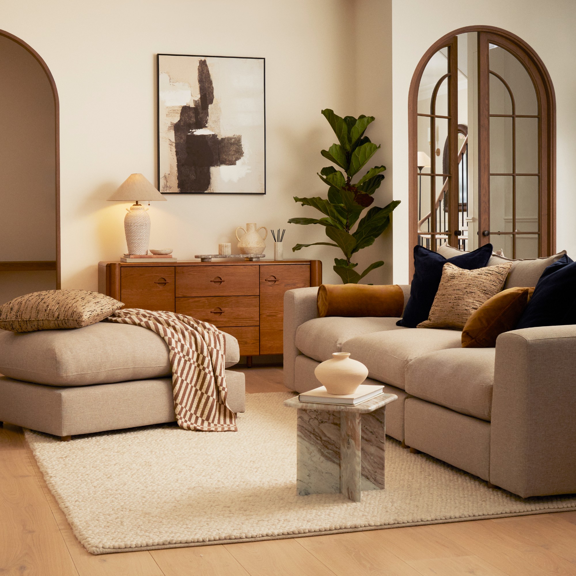 A neutral living room with Dunelm's marble side table