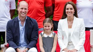 Prince William, Duke of Cambridge, Princess Charlotte of Cambridge and Catherine, Duchess of Cambridge smiling during a visit to SportsAid House at the 2022 Commonwealth Games on August 02, 2022 in Birmingham, England. The Duchess became the Patron of SportsAid in 2013, Team England Futures programme is a partnership between SportsAid, Sport England and Commonwealth Games England which will see around 1,000 talented young athletes and aspiring support staff given the opportunity to attend the Games and take a first-hand look behind-the-scenes.