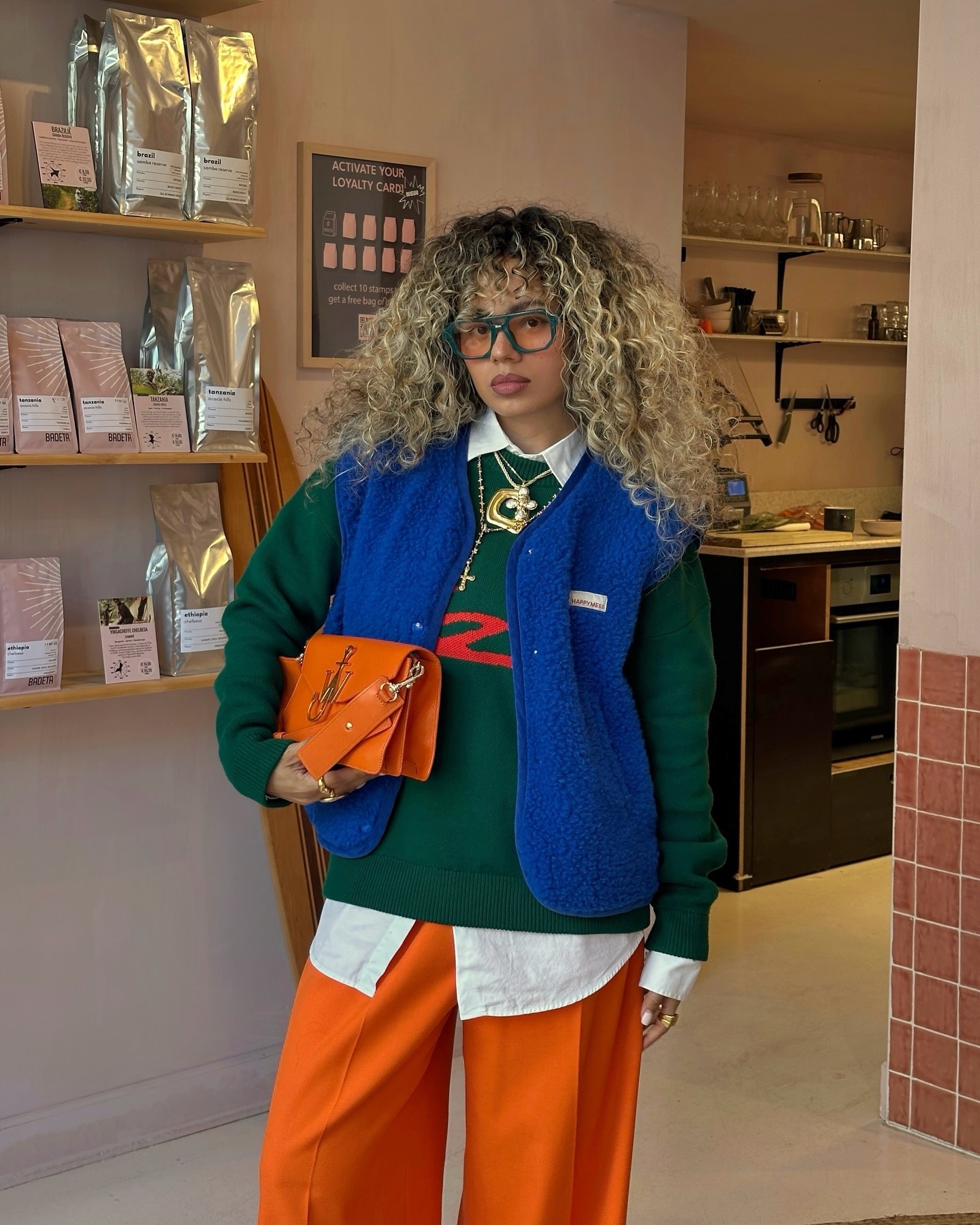 Creator @celmatique with curly, sandy blonde hair