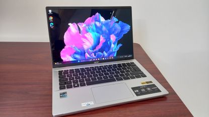 Acer Swift Go 14 laptop on desk