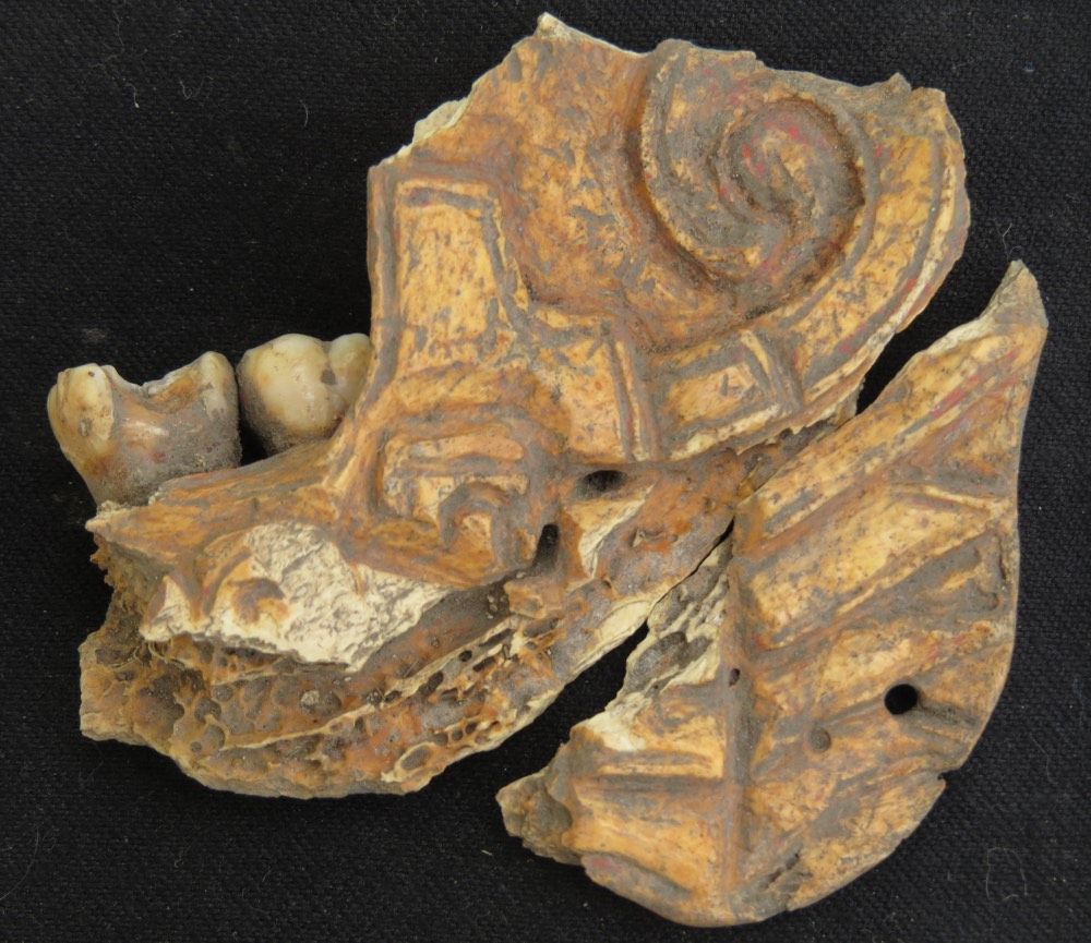 This carved and painted human mandible (jawbone) was found in a ceremonial area within a residential complex at the site of Dainzú-Macuilxóchitl in Mexico.