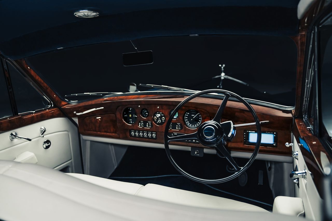 Images of the decadent Phantom V by Lunaz. It is a thing of high quality, looking very vintage with lots of walnut details and original coachwork