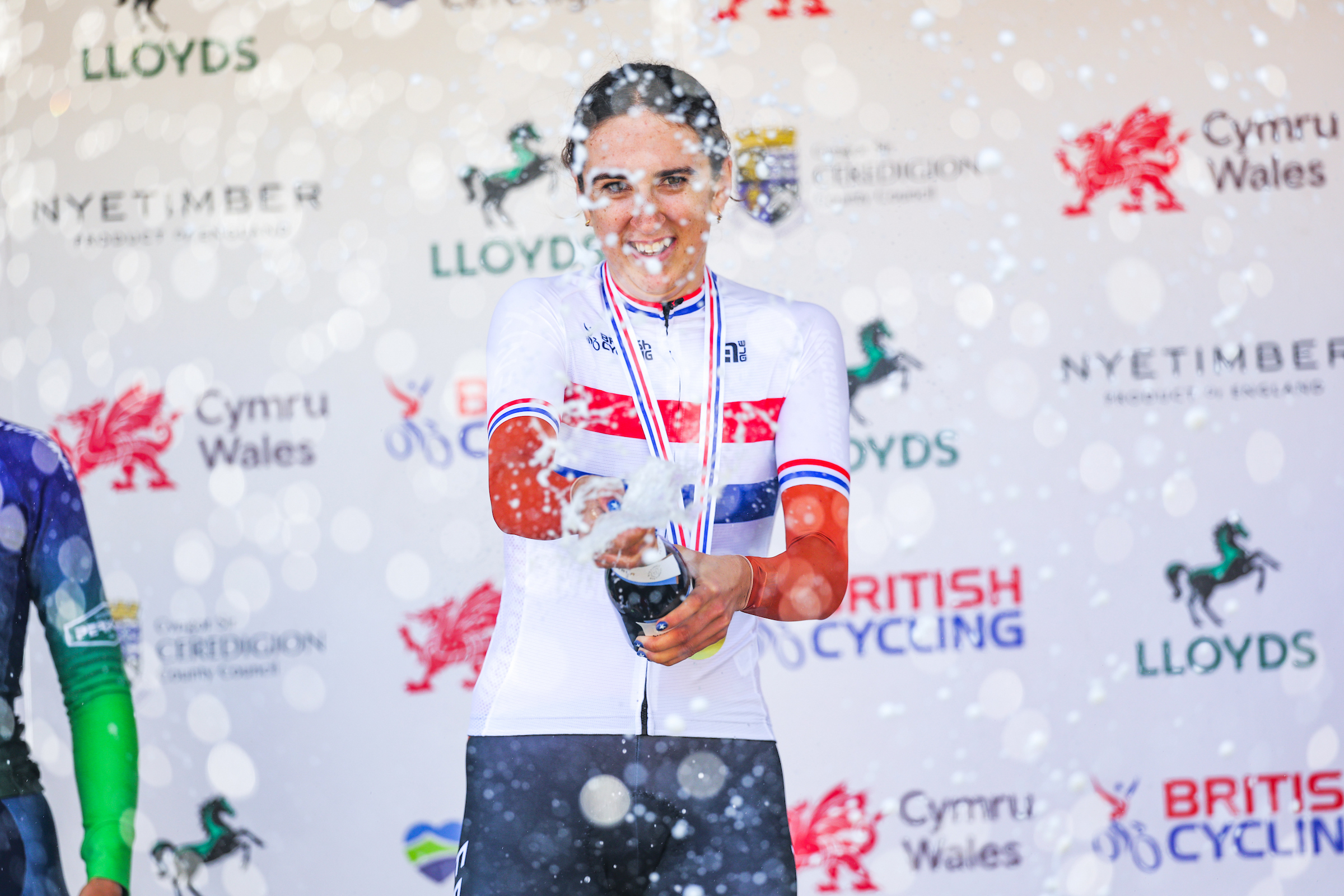 Picture by Alex Whitehead/SWpix.com - 26/06/2025 - Cycling - 2025 Lloyds National Time Trial Championships - Aberaeron, Ceredigion, Wales - Elite Men -Under-23 Women Podium - Millie Couzens (Fenix-Deceuninck) Wins the U23 Women&#039;s Individual Time Trial to become National Champion