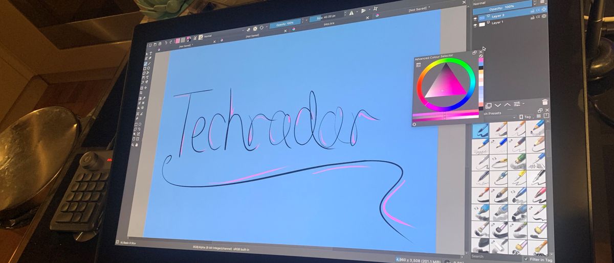 Huion Kamvas Pro 24(4K) with TechRadar written on scren