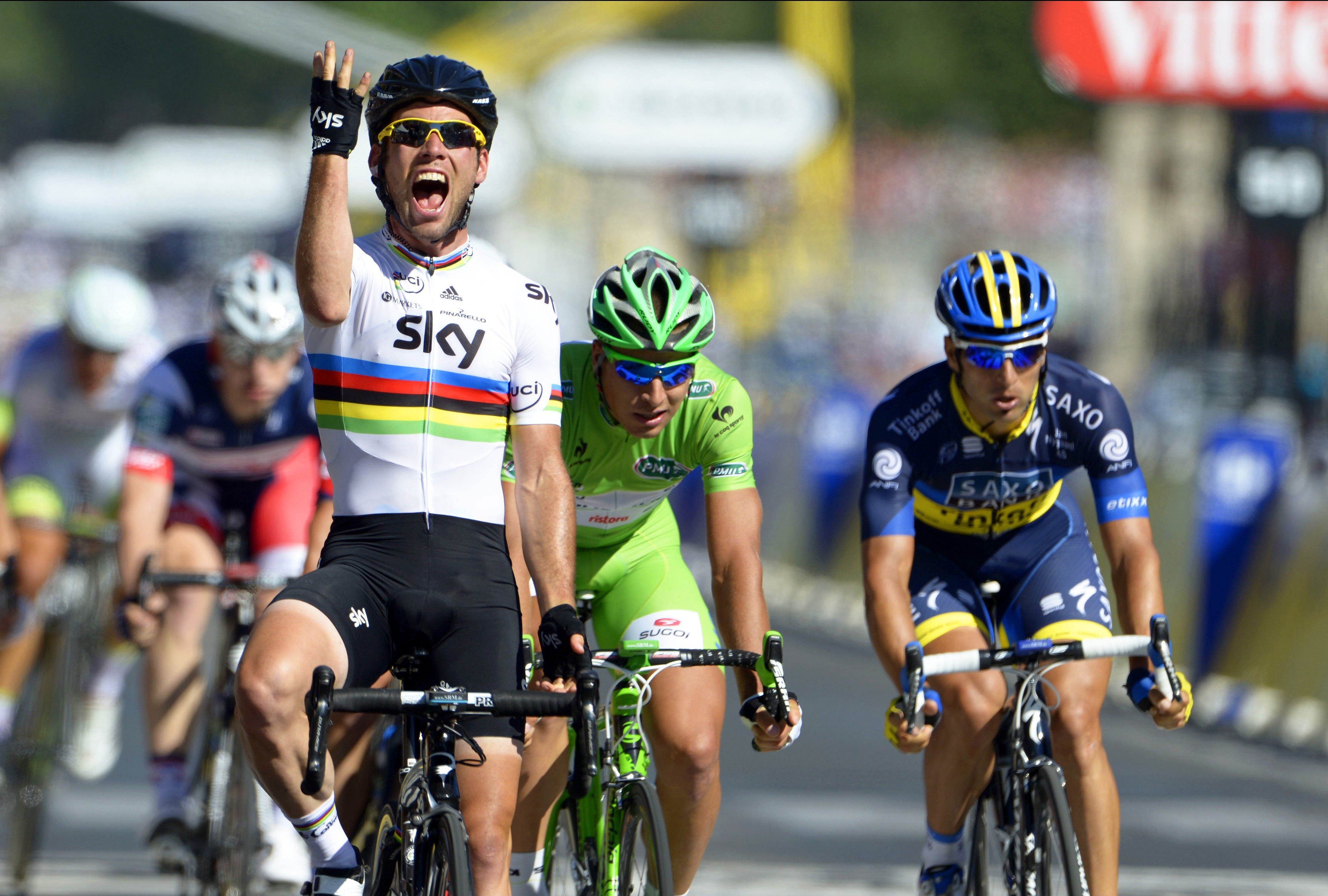 Cavendish celebrating his fourth 2012 Tour de France stage, brilliant tan l...