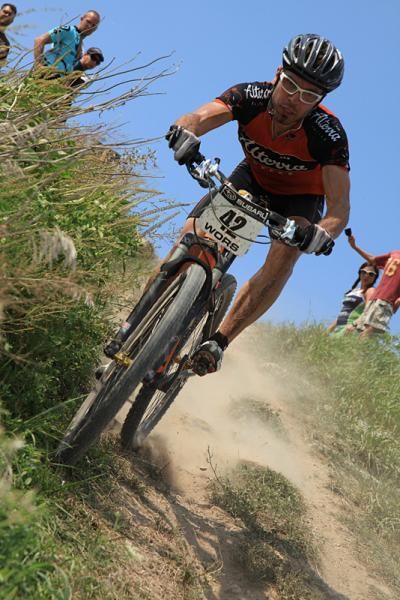 Alterra elite racer Tim Scanley plunges over the drop after cresting Crystal Ridge.