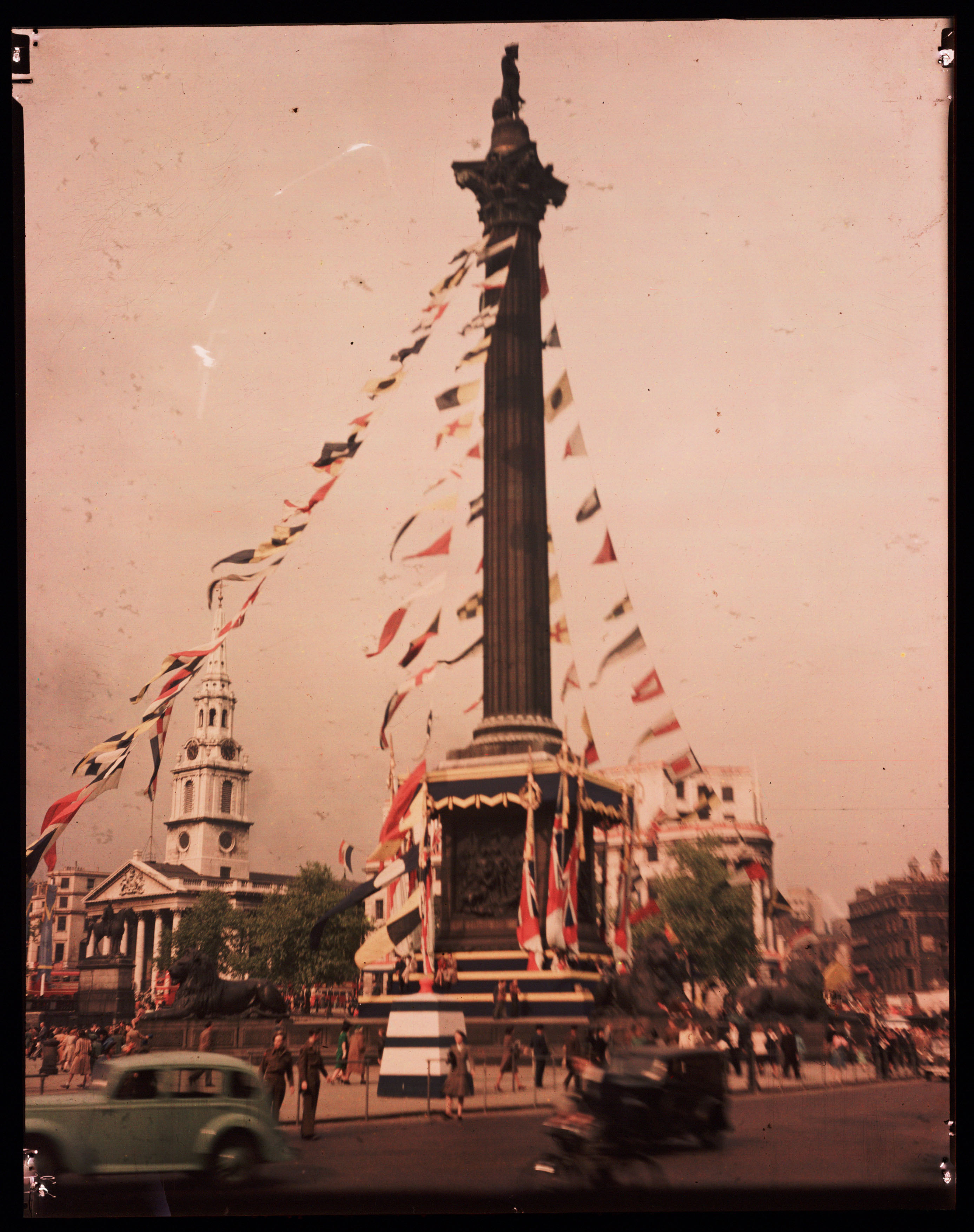 A Dufaycolor colour transparency of Trafalgar Square in London, taken by an unknown photographer in May 1945.