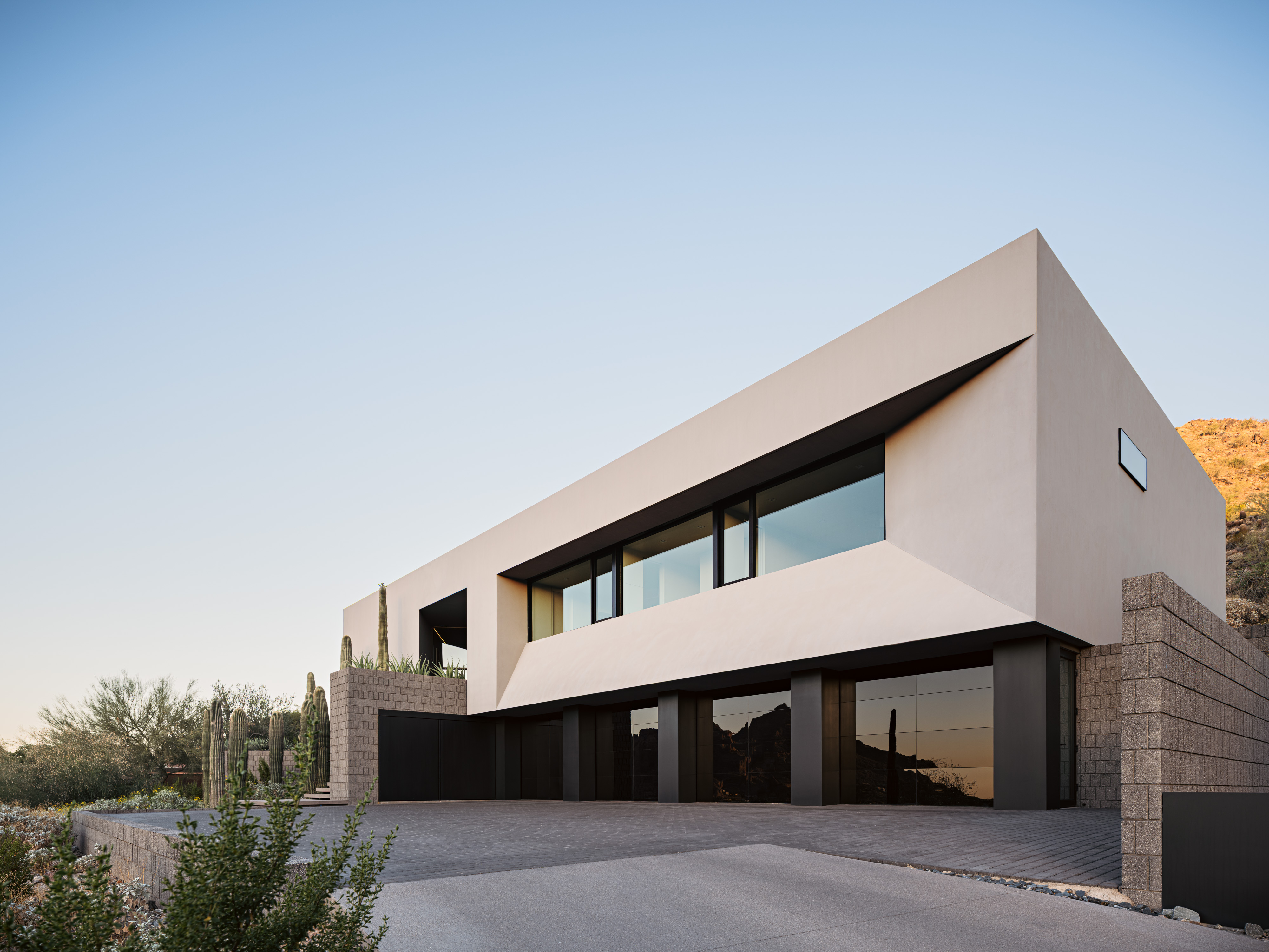 Arizona home Shifted Horizon by A-I-R, block built minimalist home, textured and monolithic looking in desert environment