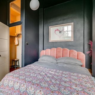 crossley bedroom with pink headboard and stool