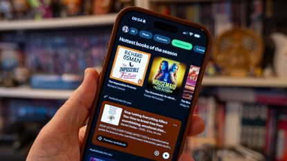 Spotify app running on Apple iPhone 17 Pro Max with audiobooks page open