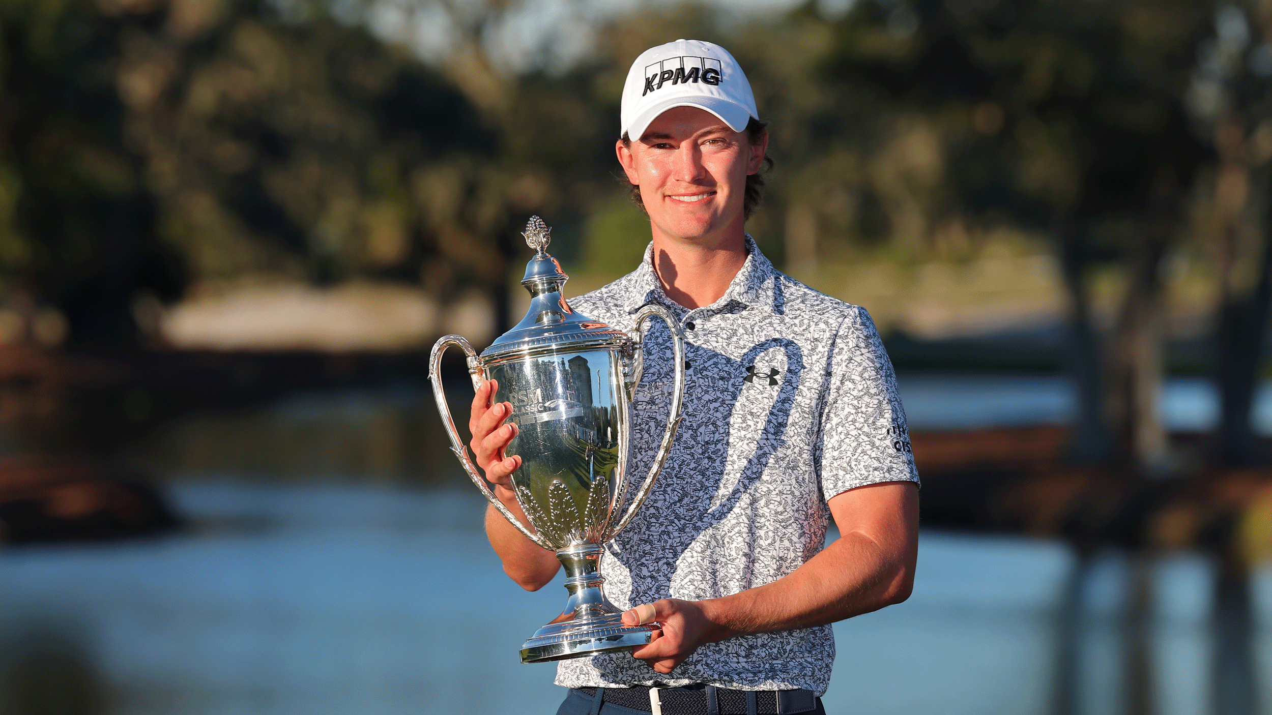 Maverick McNealy poses with the RSM Classic trophy in 2024