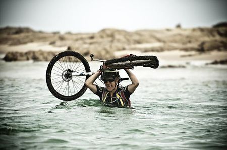 Crossing one of three rivers during the final stage of the Mountains to Beach race