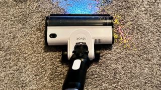 Levoit LVAC-200 being tested against sprinkles on carpet