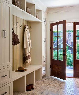 mud room with built-ins and tiled floor