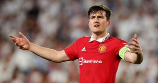 Manchester United captain Harry Maguire reacts during the UEFA Europa League Quarterfinal Second Leg match between Sevilla FC and Manchester United at Estadio Ramon Sanchez Pizjuan on April 20, 2023 in Seville, Spain.