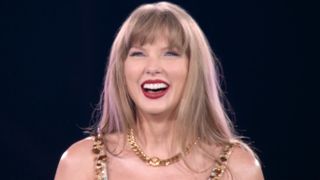 Taylor Swift smiling during the Eras Tour.
