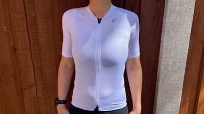 Female cyclist wearing the Velocio Women's Signature jersey