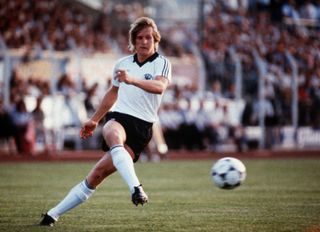 Bernd Schuster in action for West Germany in a friendly against Yugoslavia in 1983.