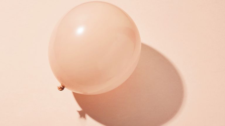  pink balloon on pink background 