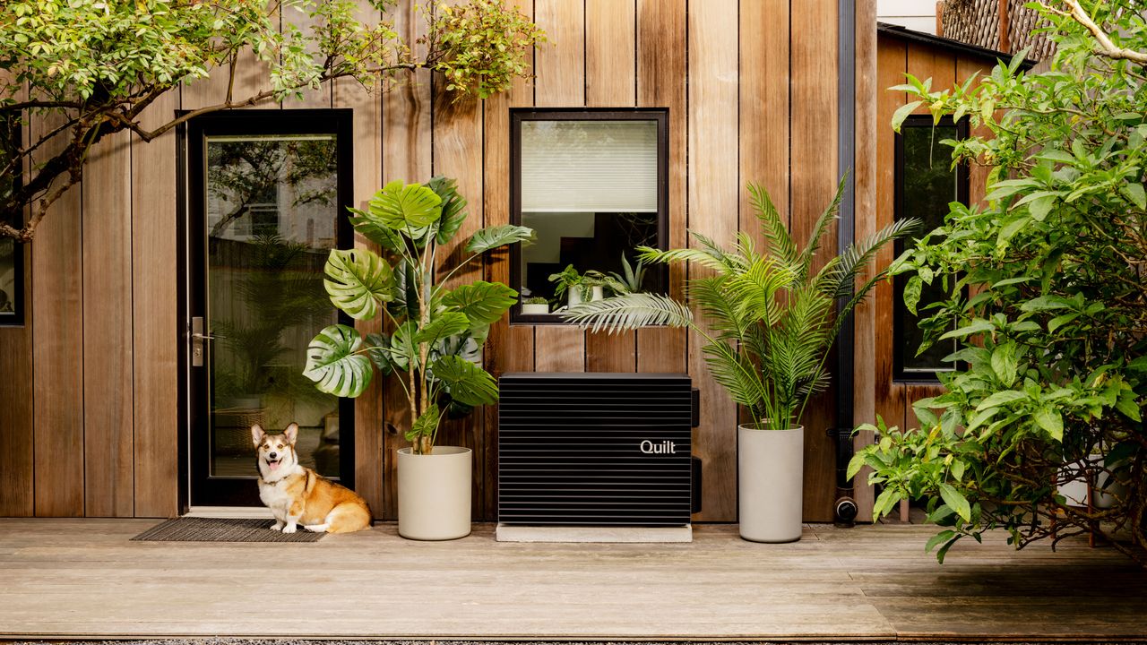 Quilt heat pump fitted to outside of modern house