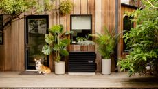 Quilt heat pump fitted to outside of modern house