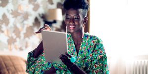 Woman looking at tablet