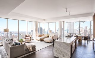 Parquet flooring and marble surfaces bring pattern into the interiors at Manhatten One