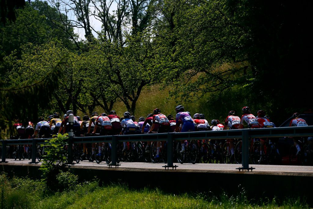 CHUR SWITZERLAND JUNE 20 A general view of the peloton passing through a landscape during the 2nd Tour de Suisse Women 2022 Stage 3 a 1242km stage from Vaduz to Chur on June 20 2022 in Chur Switzerland Photo by Heinz ZwickyGetty Images