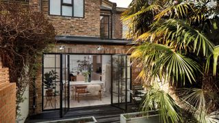 single storey brick extension with metal french doors