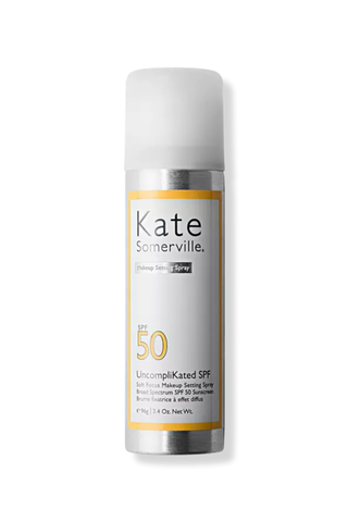An unopened bottle of Kate Somervile UncompliKated SPF against a white background.