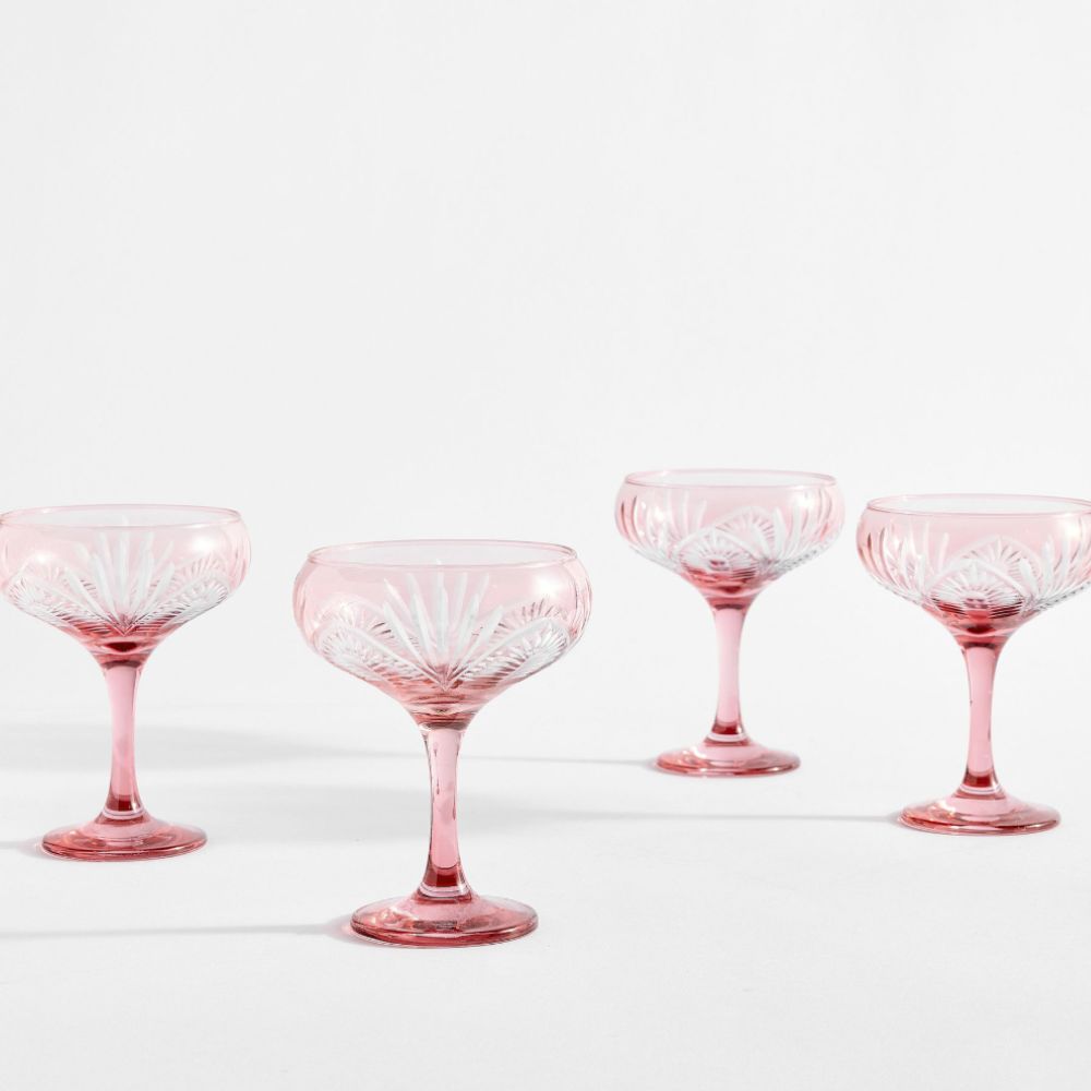 Set of four cut glass pink coupe glasses