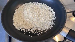 Sesame seeds in a frying pan