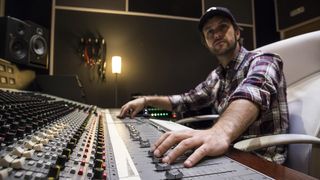 Man mixing on a large mixing desk